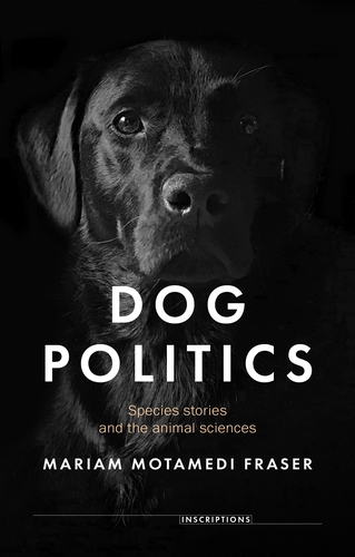 Cover of a book called Dog Politics showing a front-on photograph of a black Labrador against a black background
